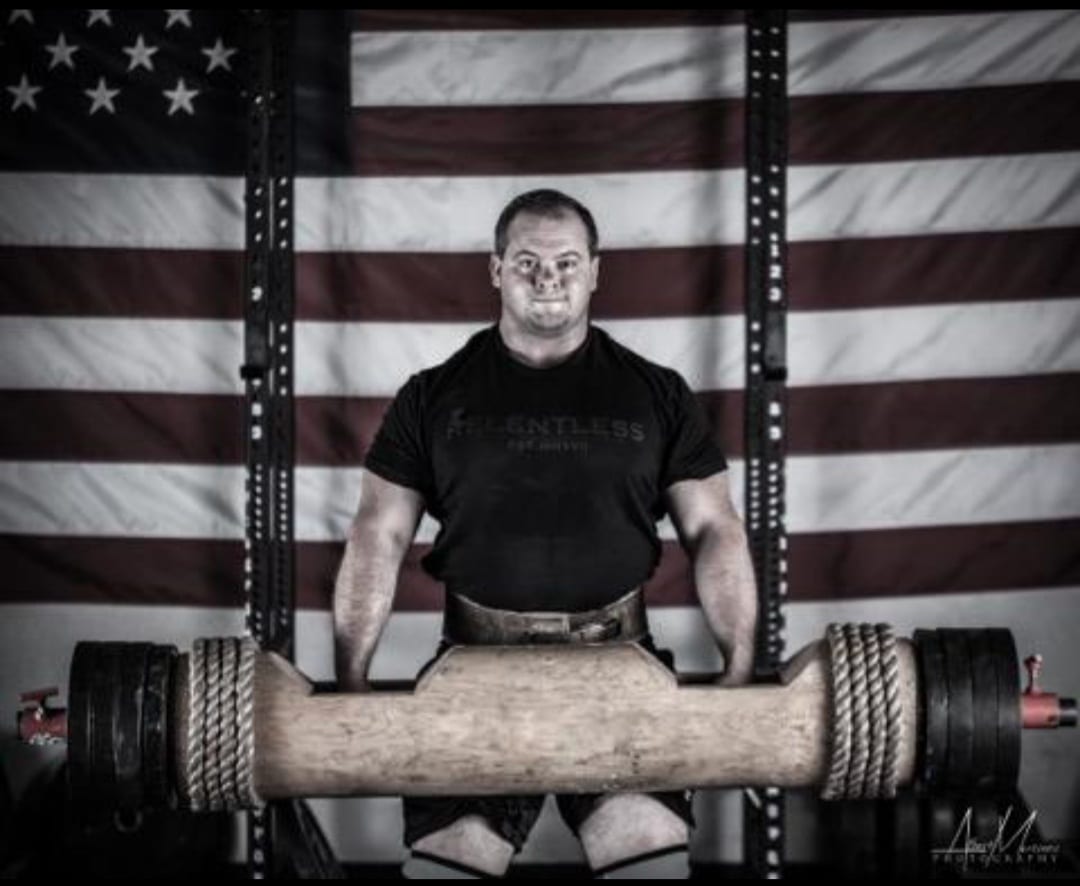 Straight arm weight lift